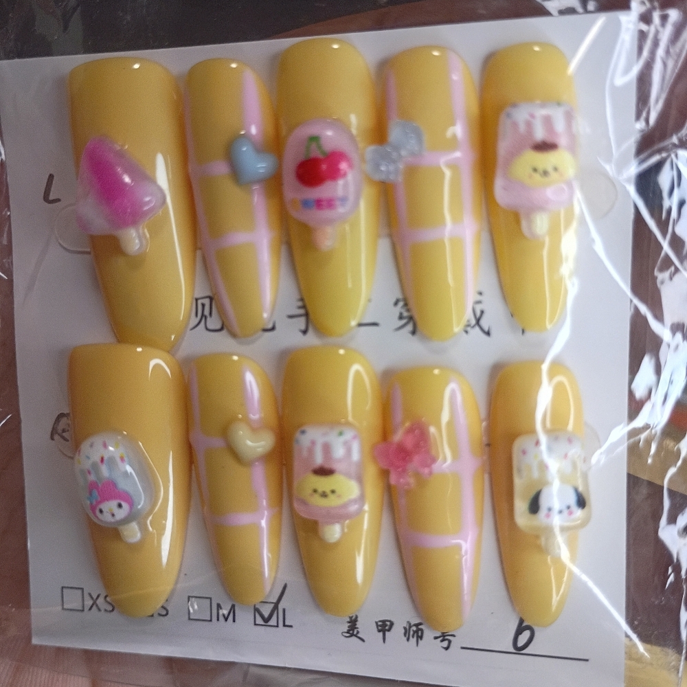 Yellow Press-On Nails with Cute Charms